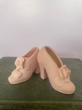 Miniature pink ceramic shoe figurines